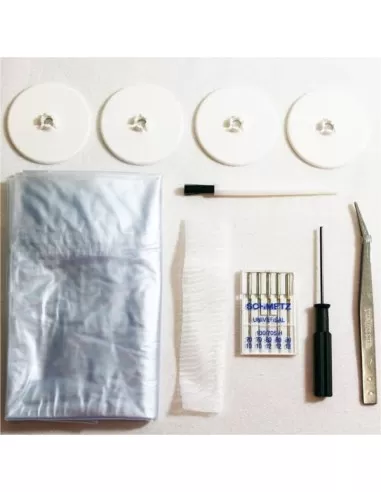 The accessories supplied with the Juki MCS1500N Cover Stitch Machine