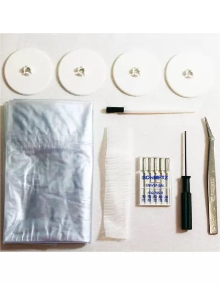 The accessories supplied with the Juki MCS1500N Cover Stitch Machine