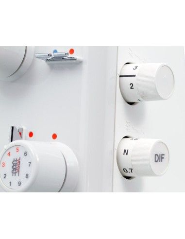 The controls for adjusting the differential and stitch length are at your fingertips on the Juki MO 654